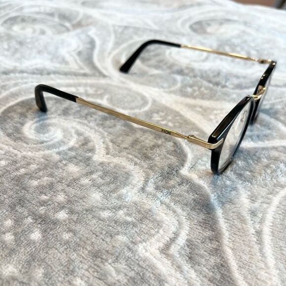 MCM 2610 prescription glasses. Case not included. Script lens removed.